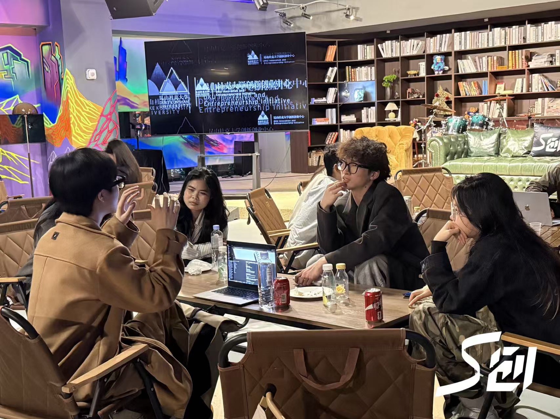 Participants in a small-group Founder Circle discussion
